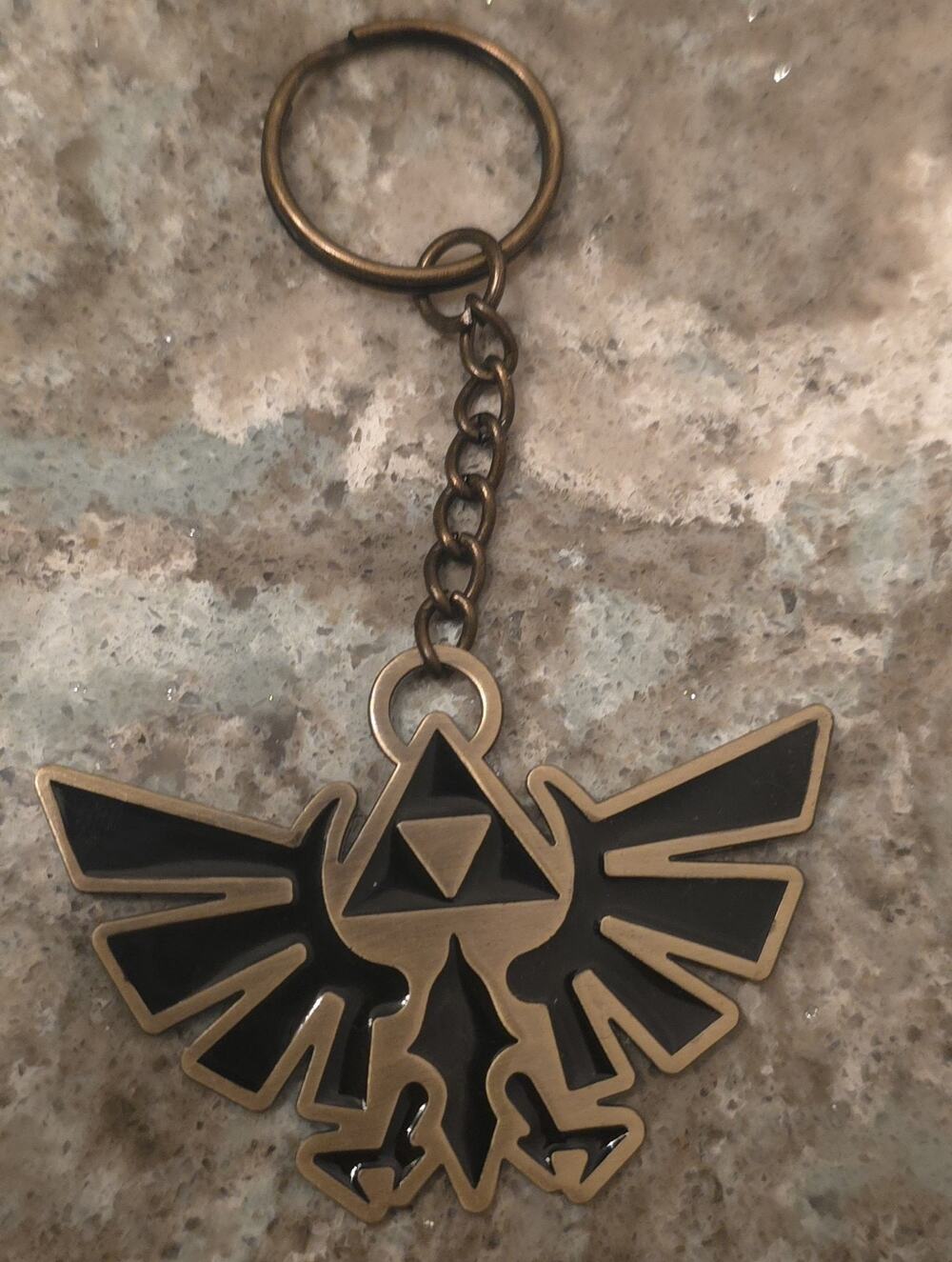 2012 Nintendo Legend of Zelda gold tone triforce logo keychain